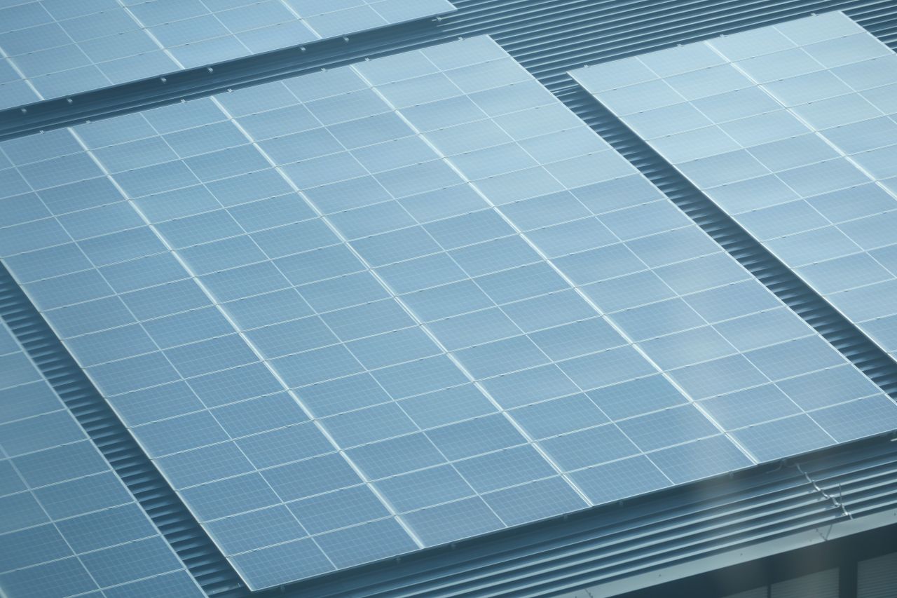 Services Detailed view of solar panels installed on a rooftop, showcasing green energy.